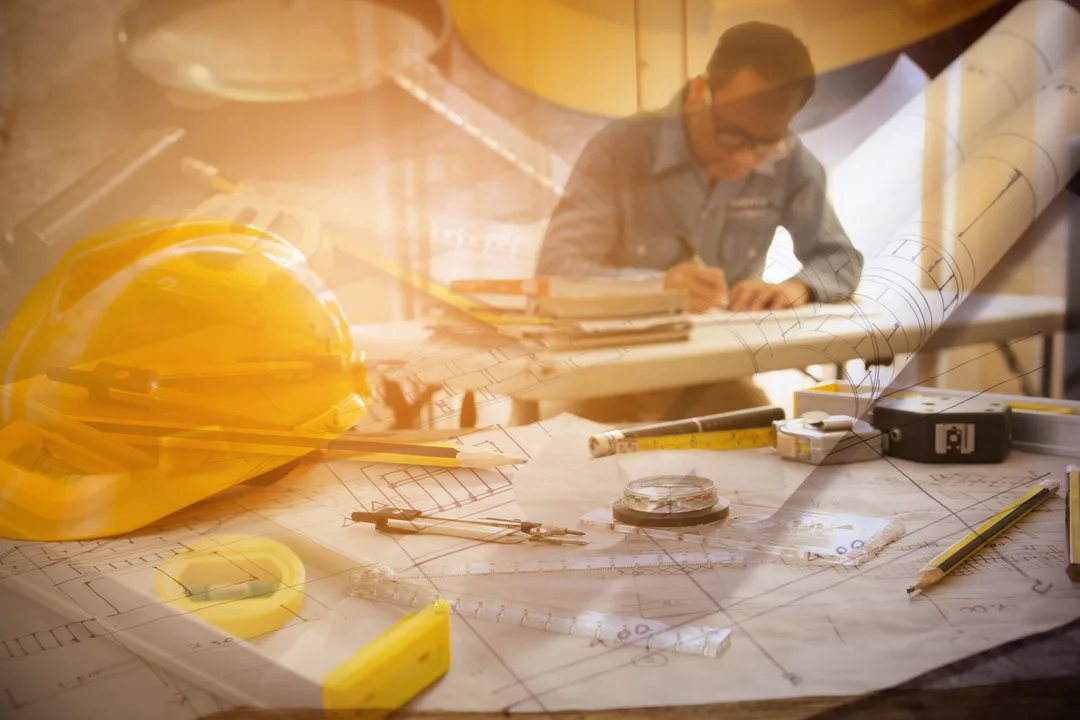 Architect man working with blueprints in workplace for architectural plan